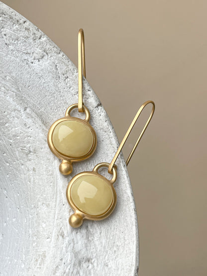 Gold plated wire hook earrings with honey amber