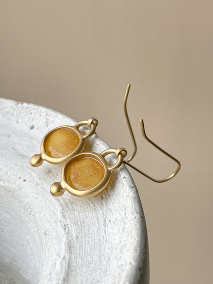 Gold plated wire hook earrings with honey amber