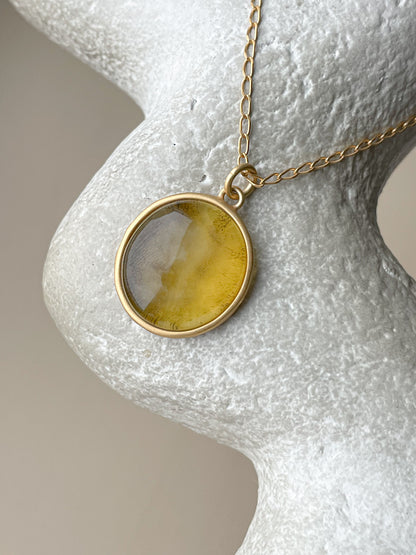 Gold plated pendant with yellow amber