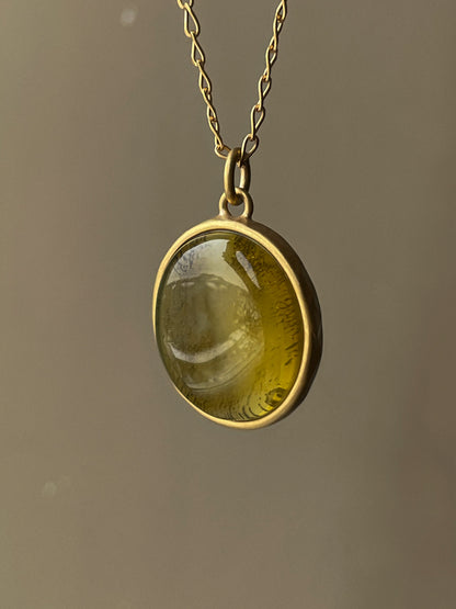 Gold plated pendant with yellow amber