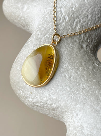 Gold plated pendant with mixed amber