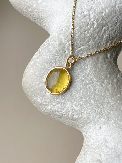 Gold plated pendant with yellow amber