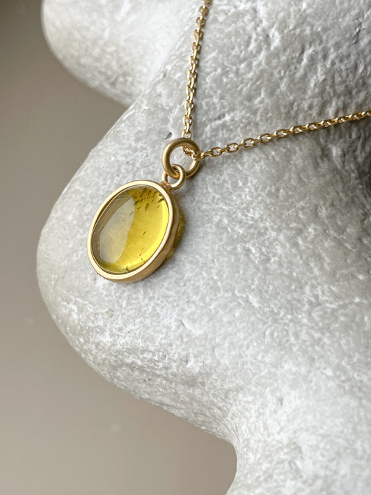 Gold plated pendant with yellow amber