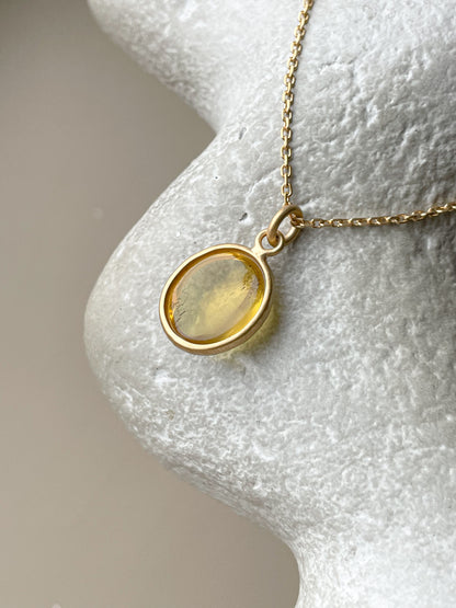 Gold plated pendant with yellow amber