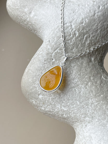 Sterling silver pendant with honey amber