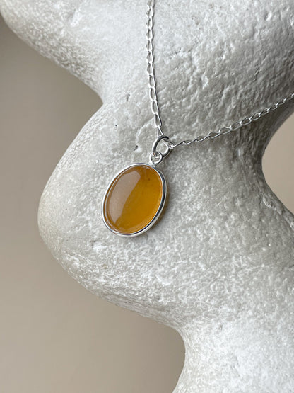 Sterling silver pendant with honey amber