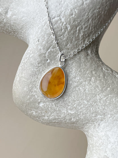 Sterling silver pendant with yellow amber