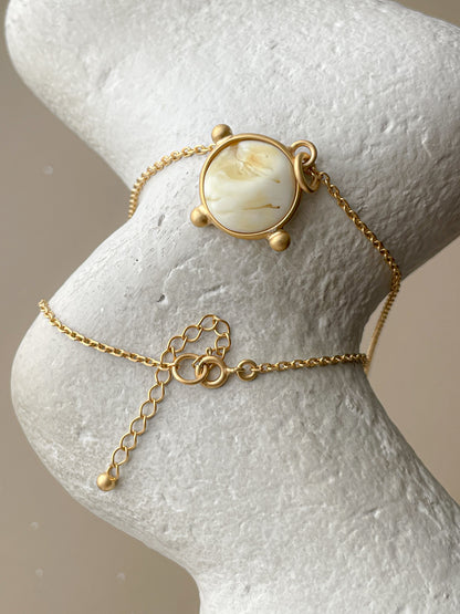 Gold plated pendant with white amber