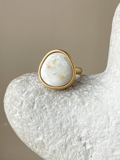 Large gold-plated ring with white amber, size 7 1/2