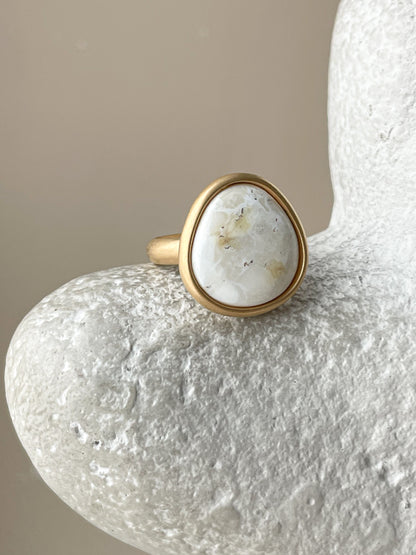 Large gold-plated ring with white amber, size 7 1/2