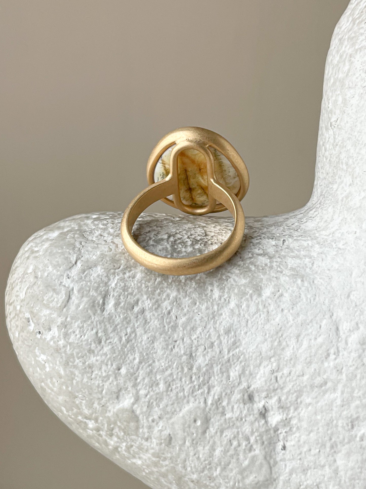 Large gold-plated ring with white amber, size 7 1/2