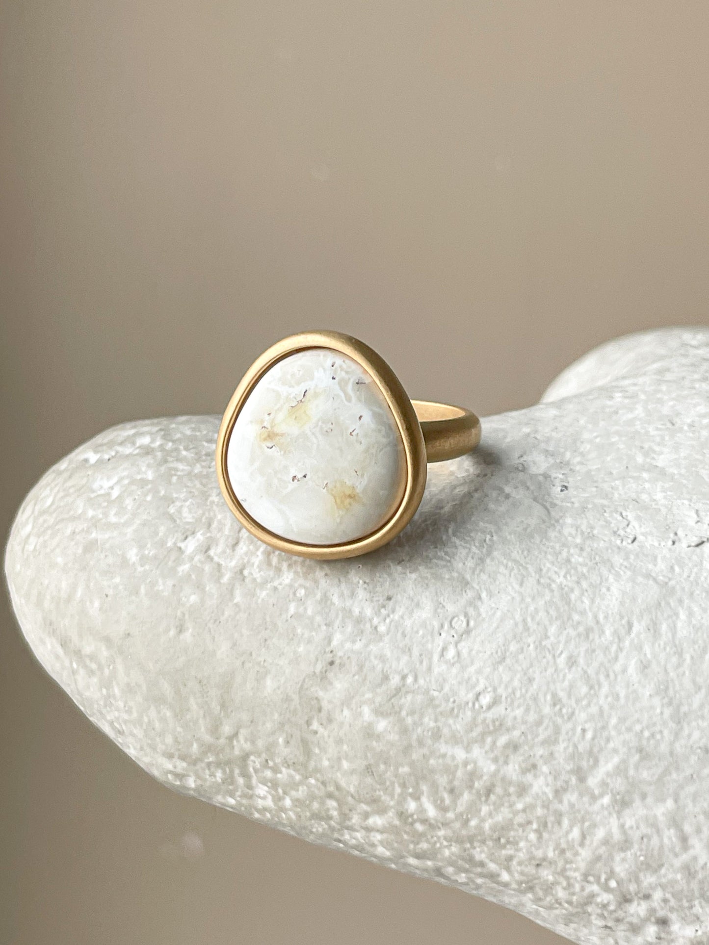 Large gold-plated ring with white amber, size 7 1/2