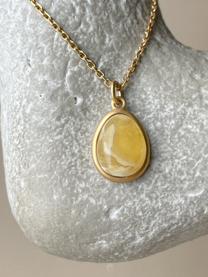 Gold plated pendant with butterscotch amber