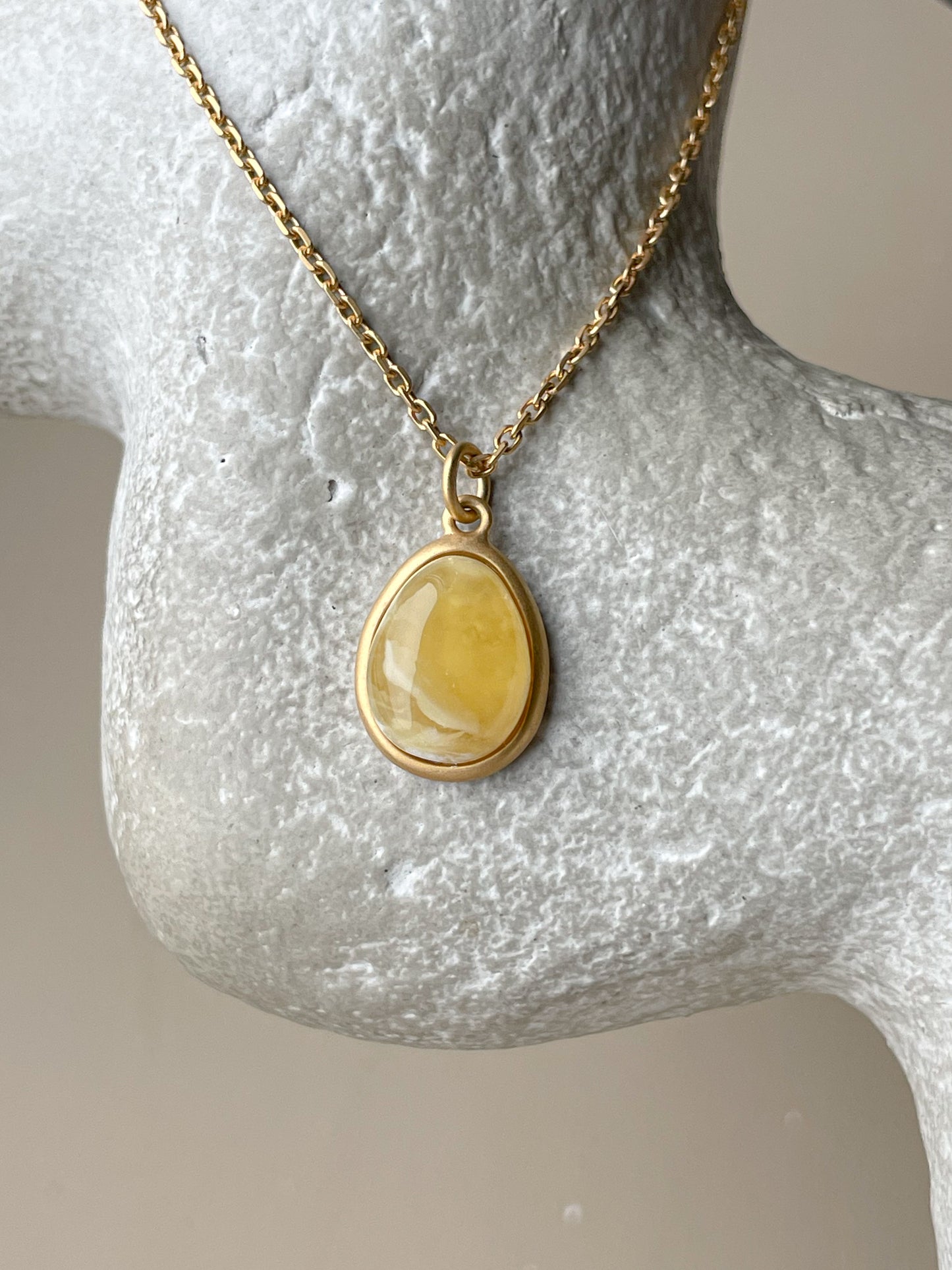 Gold plated pendant with butterscotch amber