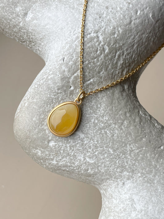 Gold plated pendant with butterscotch amber