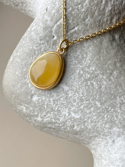 Gold plated pendant with butterscotch amber