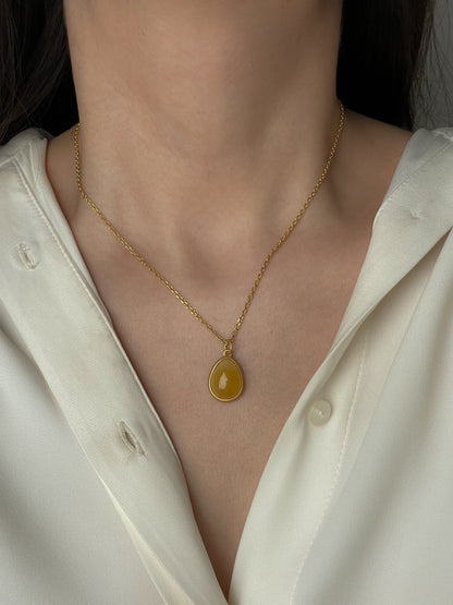 Gold plated pendant with butterscotch amber