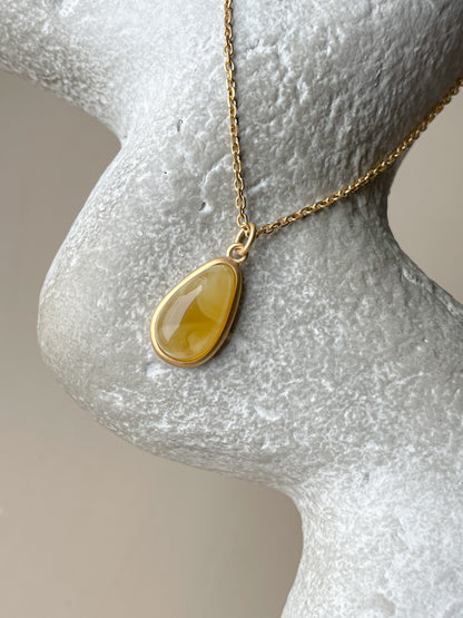 Gold plated pendant with butterscotch amber