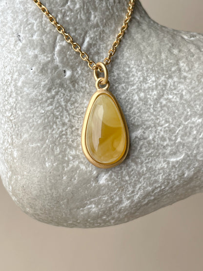 Gold plated pendant with butterscotch amber