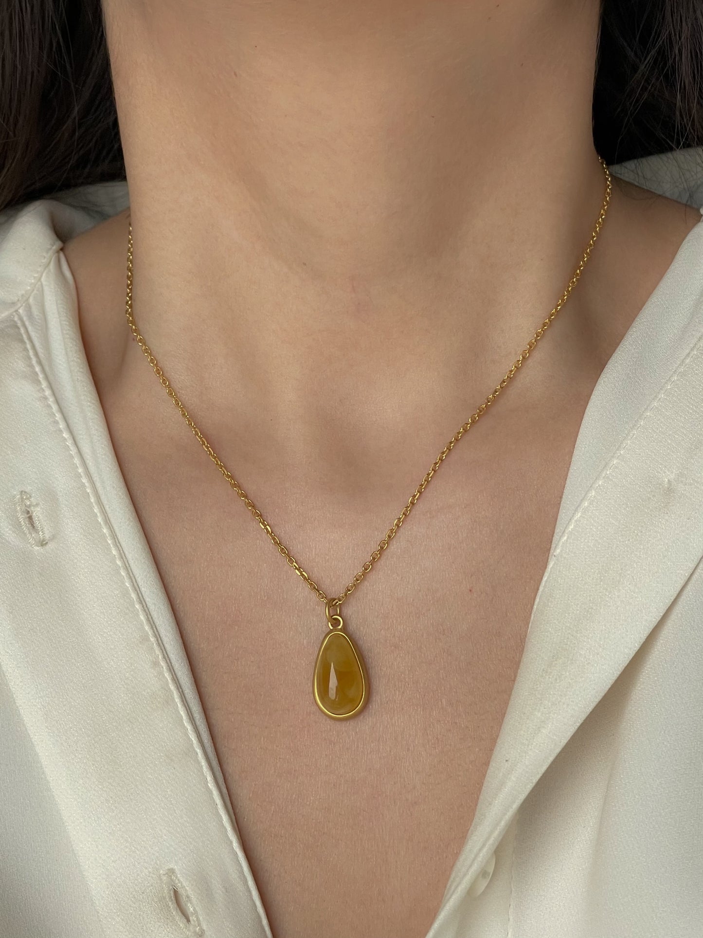 Gold plated pendant with butterscotch amber