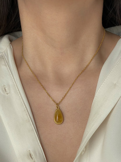 Gold plated pendant with butterscotch amber