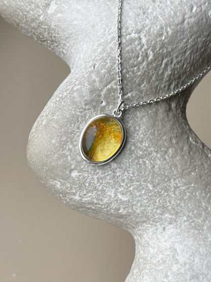 Sterling silver pendant with honey amber