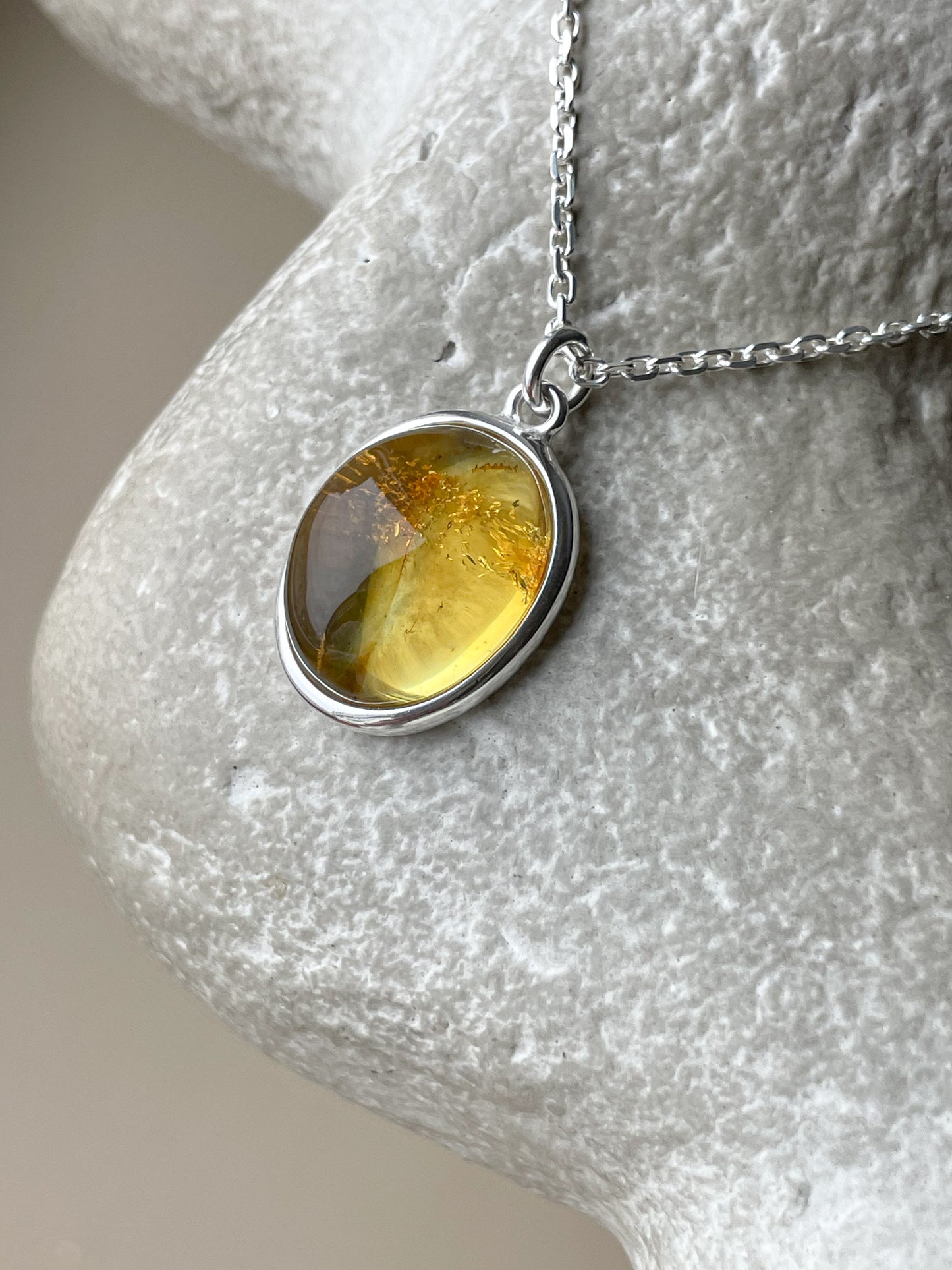 Sterling silver pendant with honey amber