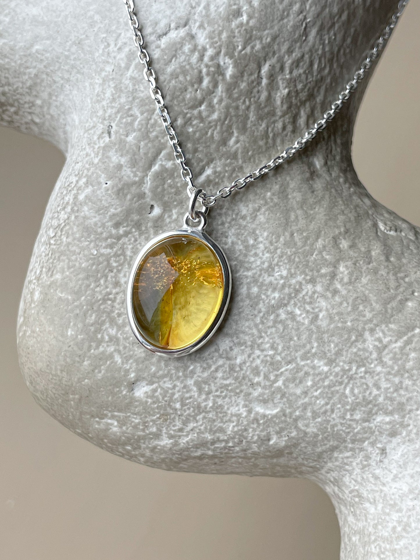 Sterling silver pendant with honey amber