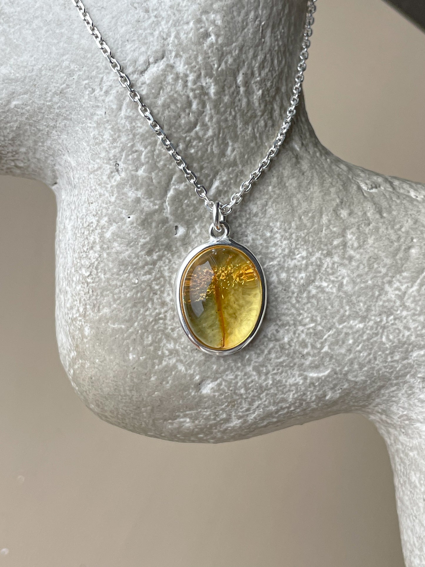 Sterling silver pendant with honey amber