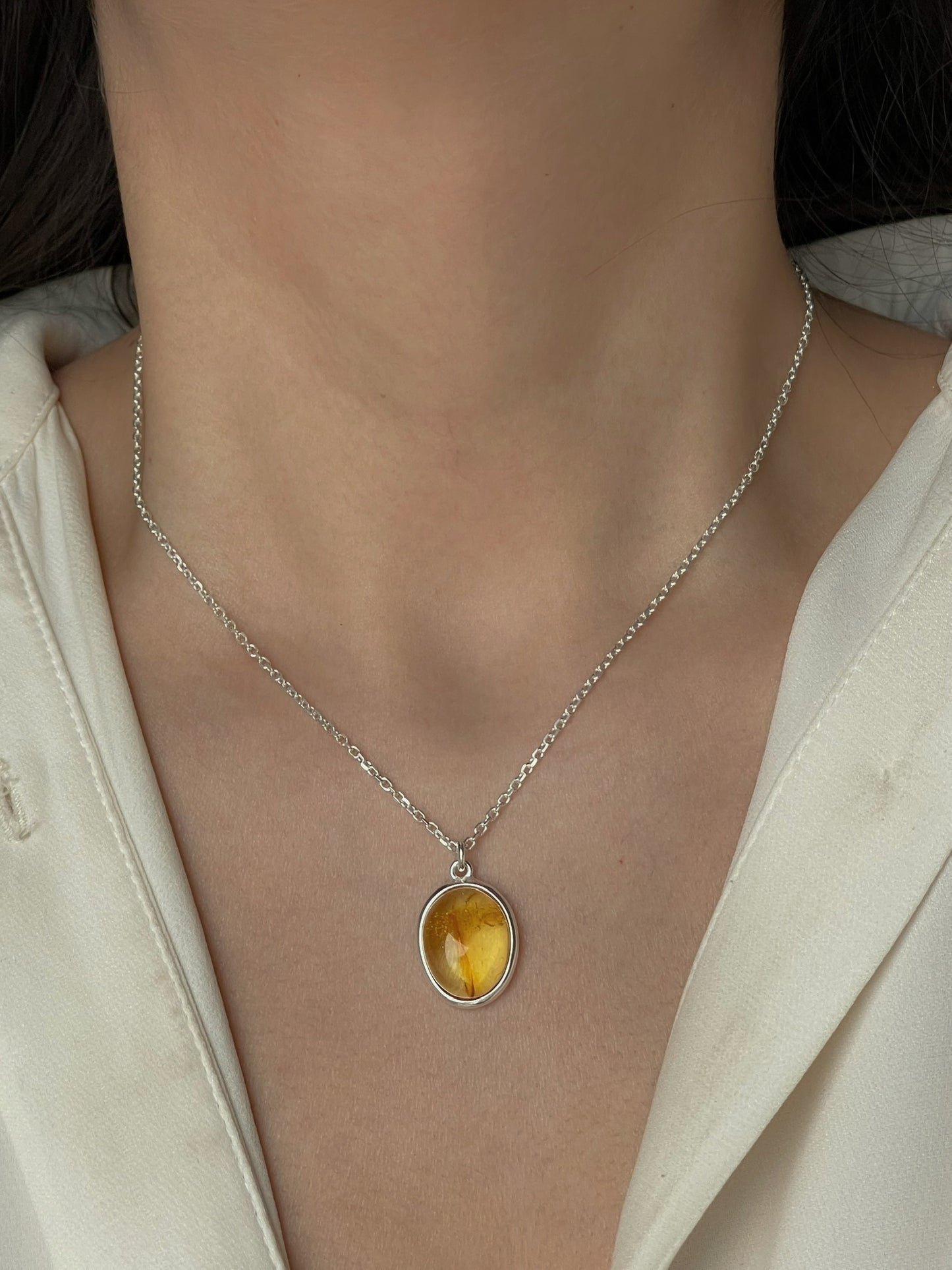 Sterling silver pendant with honey amber