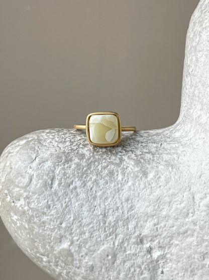 Gold plated silver ring with milky amber, size 6