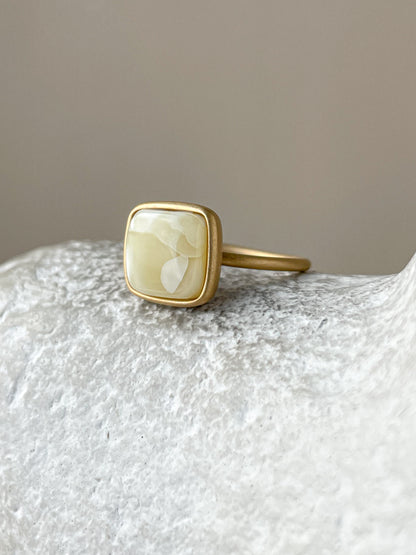 Gold plated silver ring with milky amber, size 6