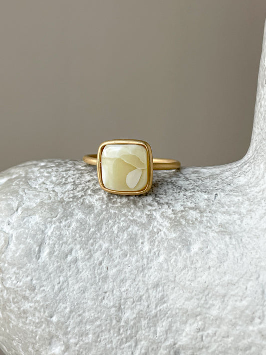 Gold plated silver ring with milky amber, size 6