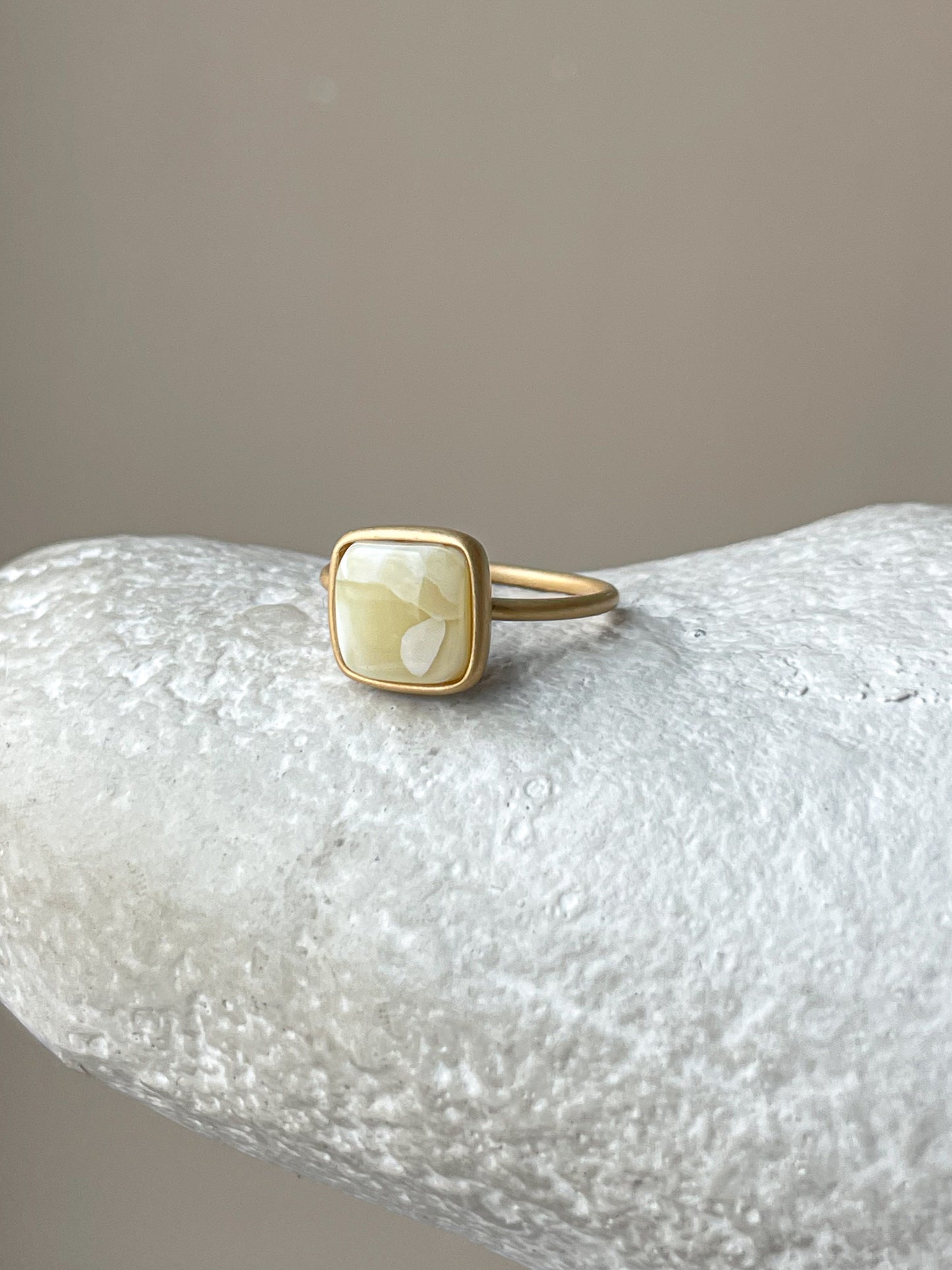 Gold plated silver ring with milky amber, size 6