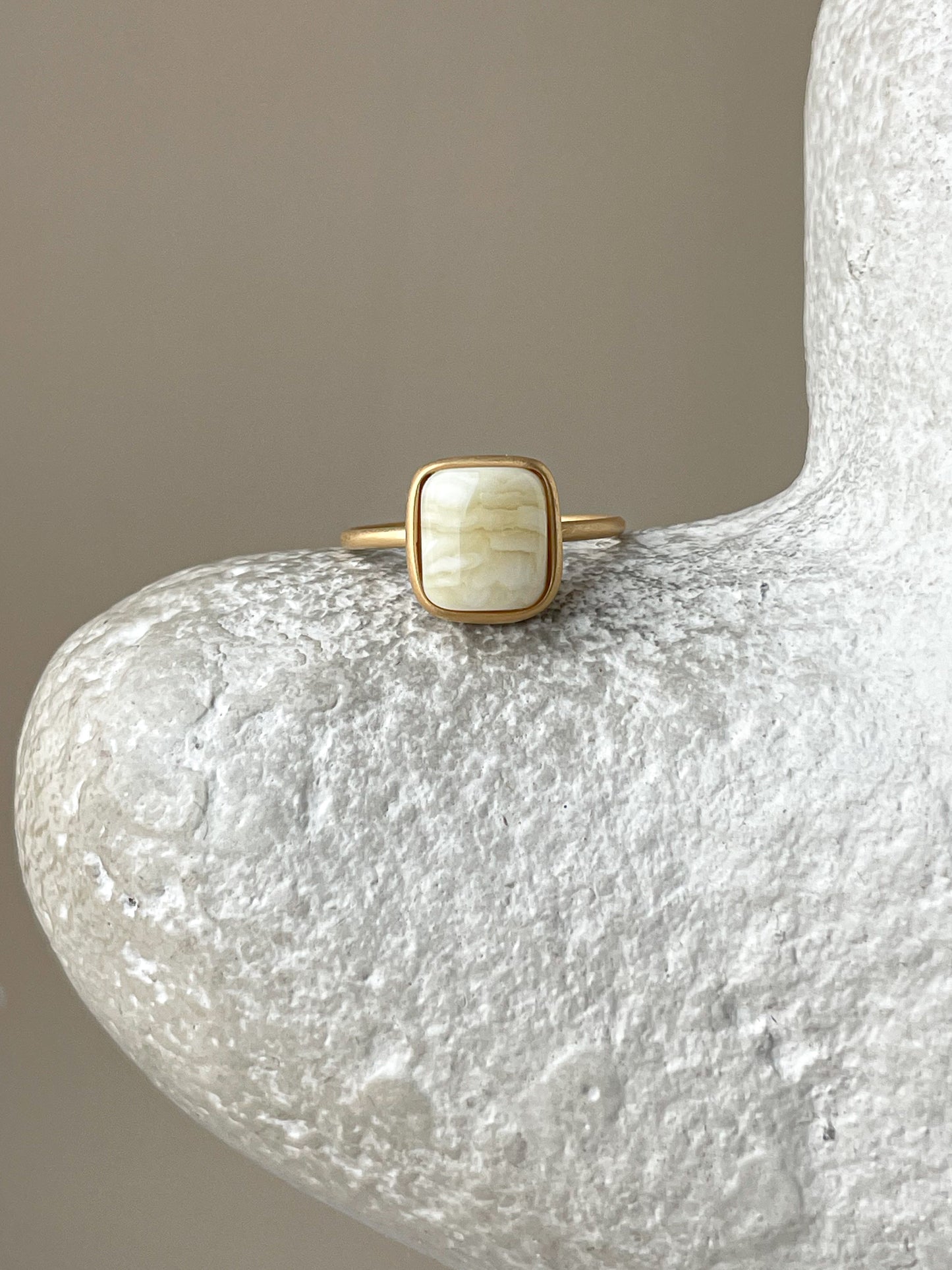 Gold plated silver ring with milky amber, size 6 3/4