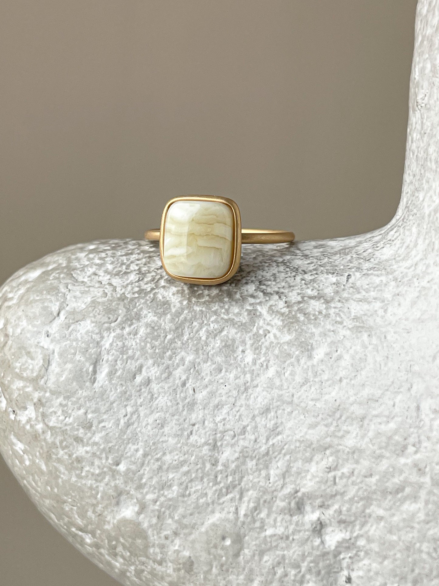 Gold plated silver ring with milky amber, size 6 3/4