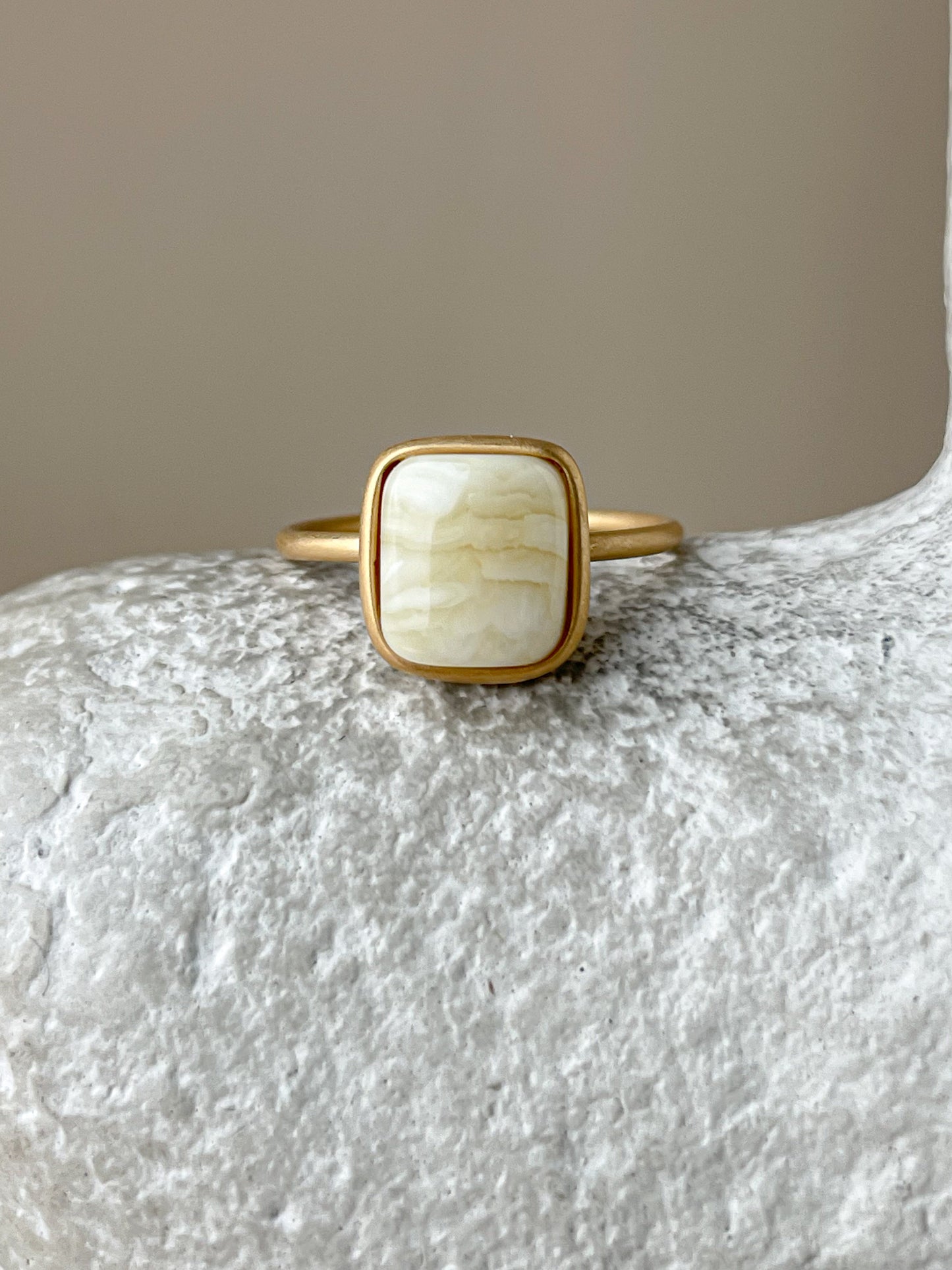 Gold plated silver ring with milky amber, size 6 3/4