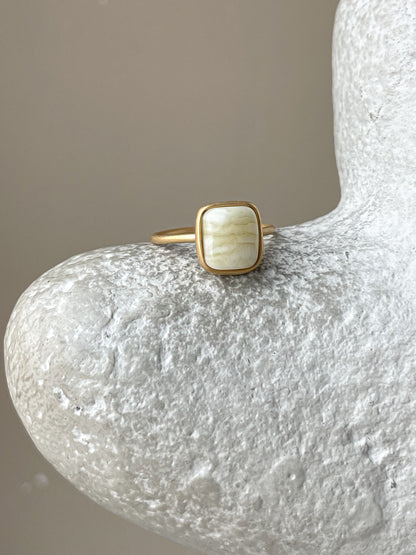 Gold plated silver ring with milky amber, size 6 3/4