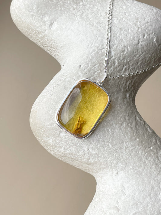 Large sterling silver pendant with honey amber stone