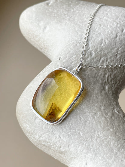 Large sterling silver pendant with honey amber stone