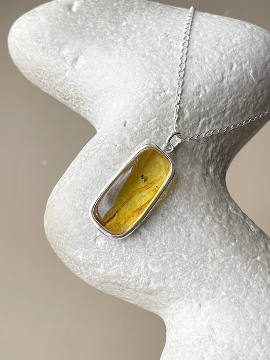 Large sterling silver pendant with honey amber stone