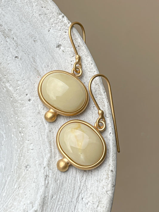 Gold plated wire hook earrings with milky amber