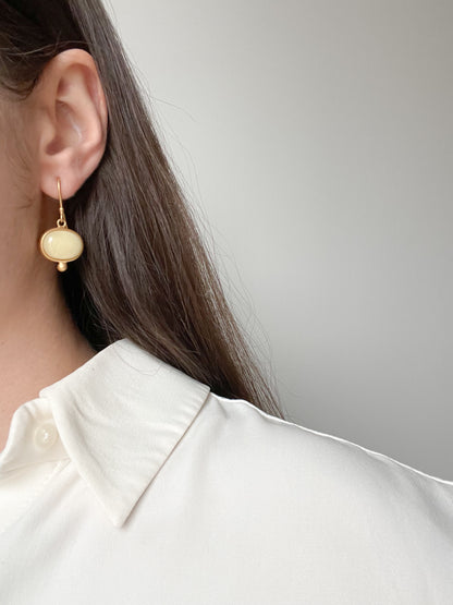 Gold plated wire hook earrings with milky amber