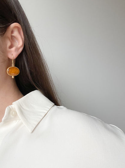 Gold plated wire hook earrings with honey amber